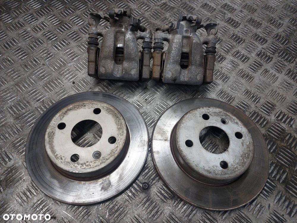 TARCZE HAMULCOWE TYŁ + KLOCKI + ZACISKI OPEL ASTRA H ID: 238055 - 1