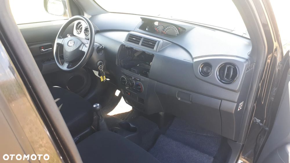 Daihatsu Materia 1.5 black edition - 18