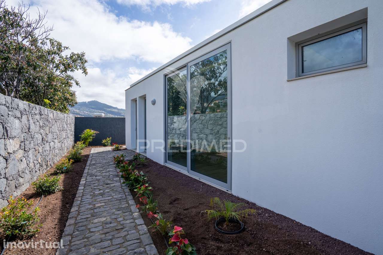 Deslumbrante Moradia T4 com vista Mar no Estreito da Calheta - Grande imagem: 3/18