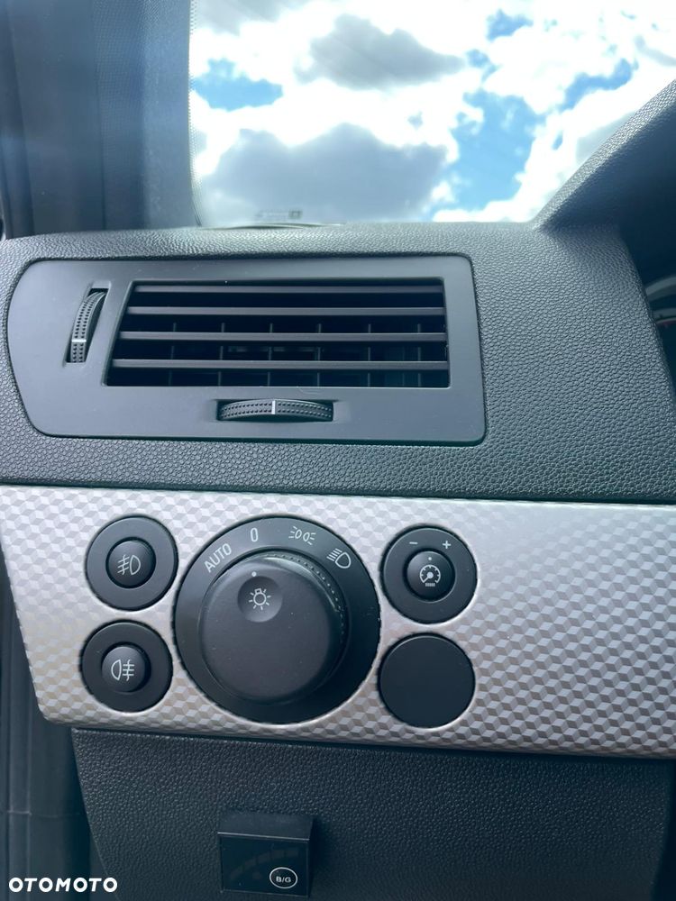 Opel Astra 1.8 Cosmo - 9