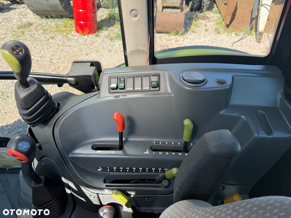 Claas Axos 320 - 19