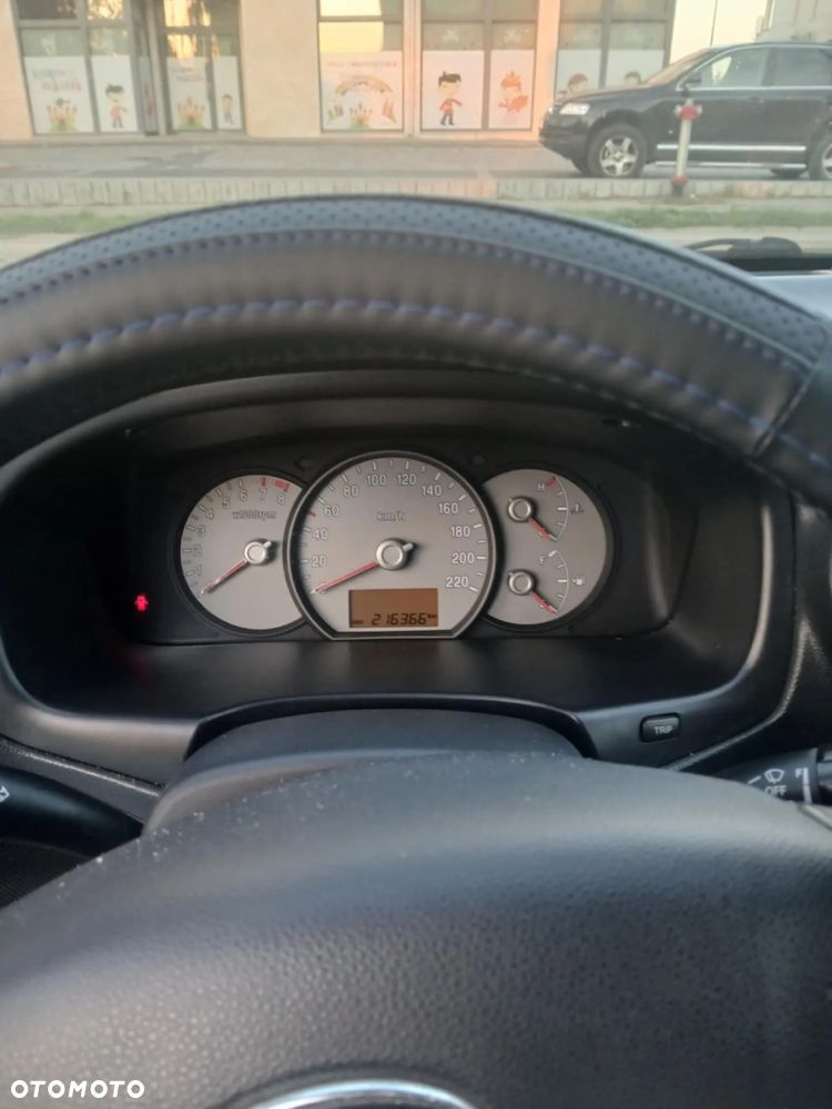 Kia Carens 2.0 CVVT Spirit - 4