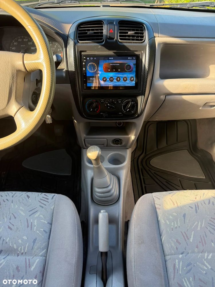 Mazda Demio 1.3 - 8
