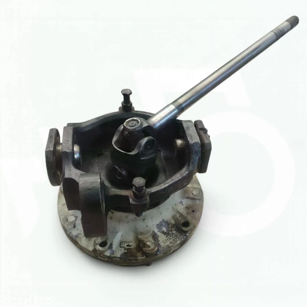 Zwrotnica 6194274M1 Zwolnica 85825032 Piasta 85825037 New Holland LB 115 - 12