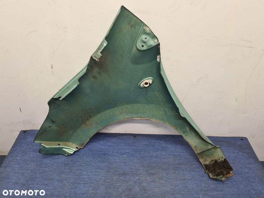 SUZUKI ALTO VII BŁOTNIK PRZÓD PRAWY  ZKZ - 8