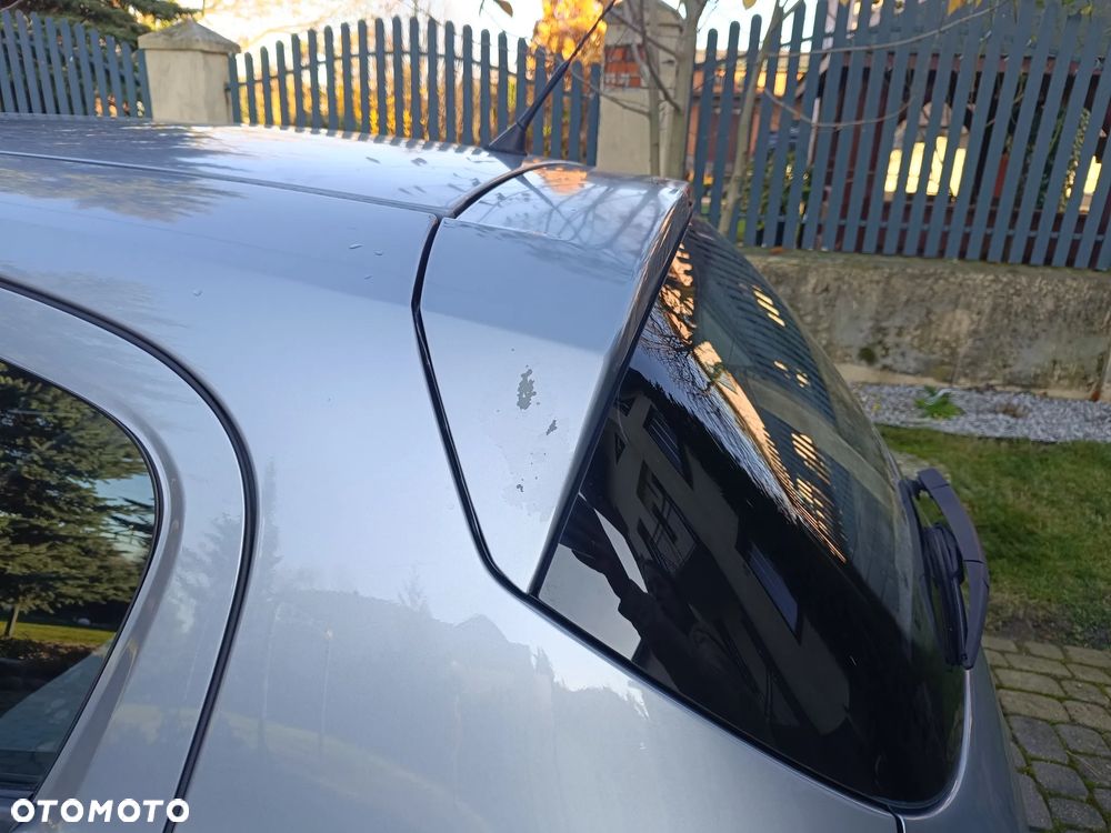 Opel Corsa 1.2 16V Cosmo - 24