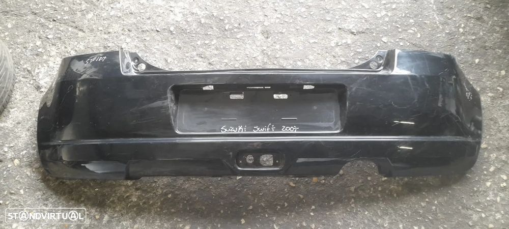 Parachoques traseiro Suzuki Swift de 2007 - 1