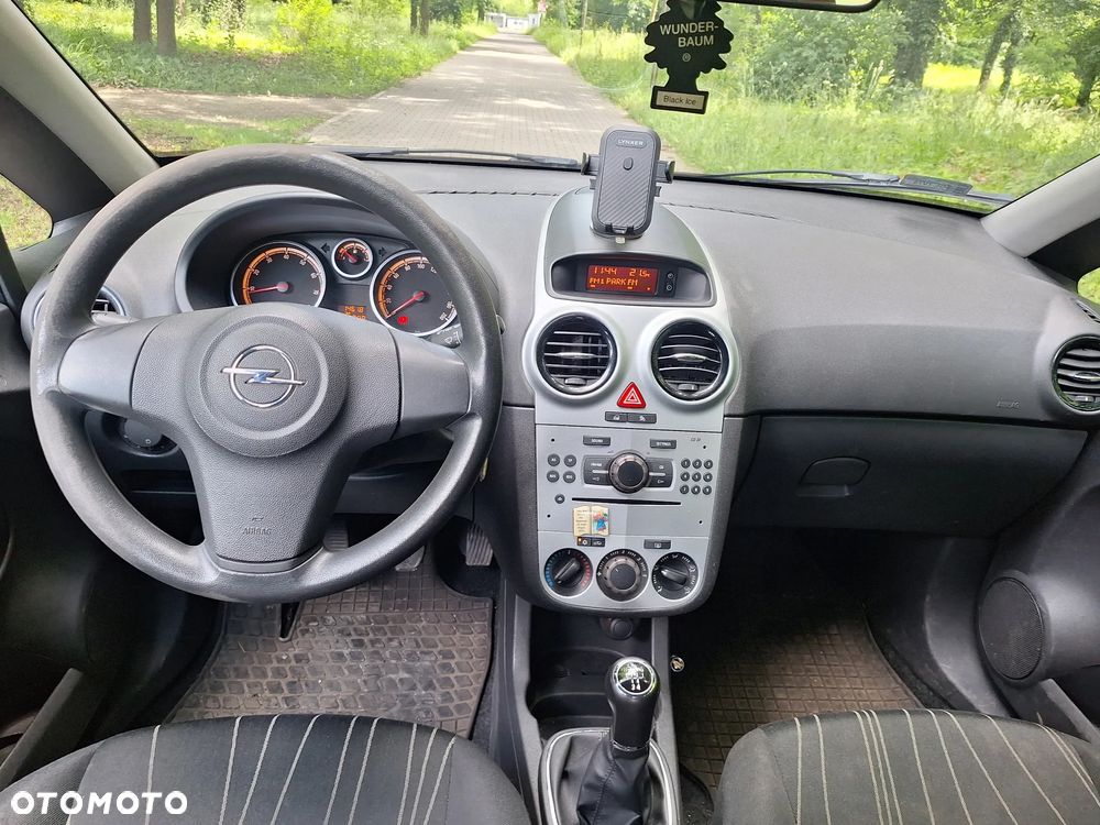 Opel Corsa 1.2 16V Enjoy - 11
