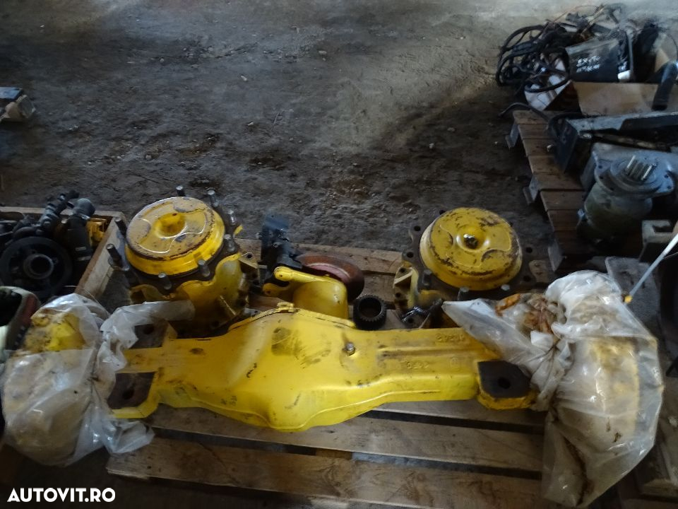 Punte, axa  Carraro   Komatsu WB 93 R5  cod. 149443 - 4