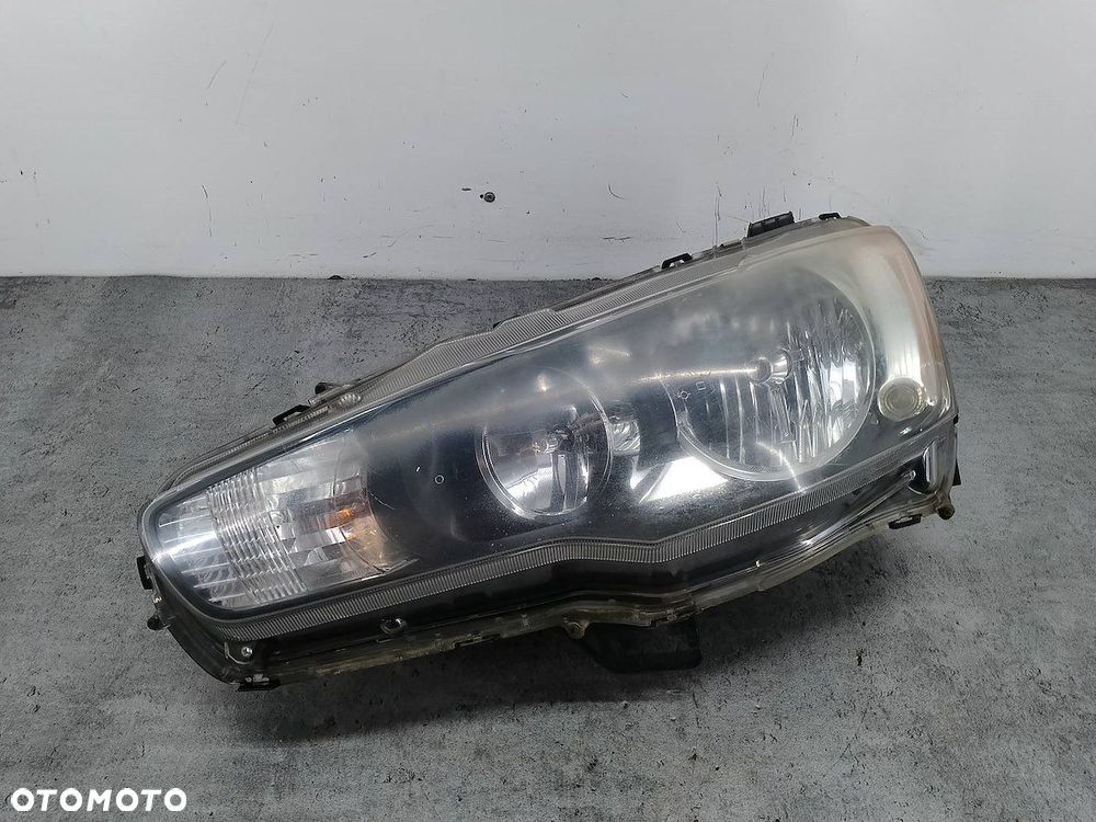 LAMPA PRZÓD LEWA MITSUBISHI LANCER IX P6117  P6118 - 1