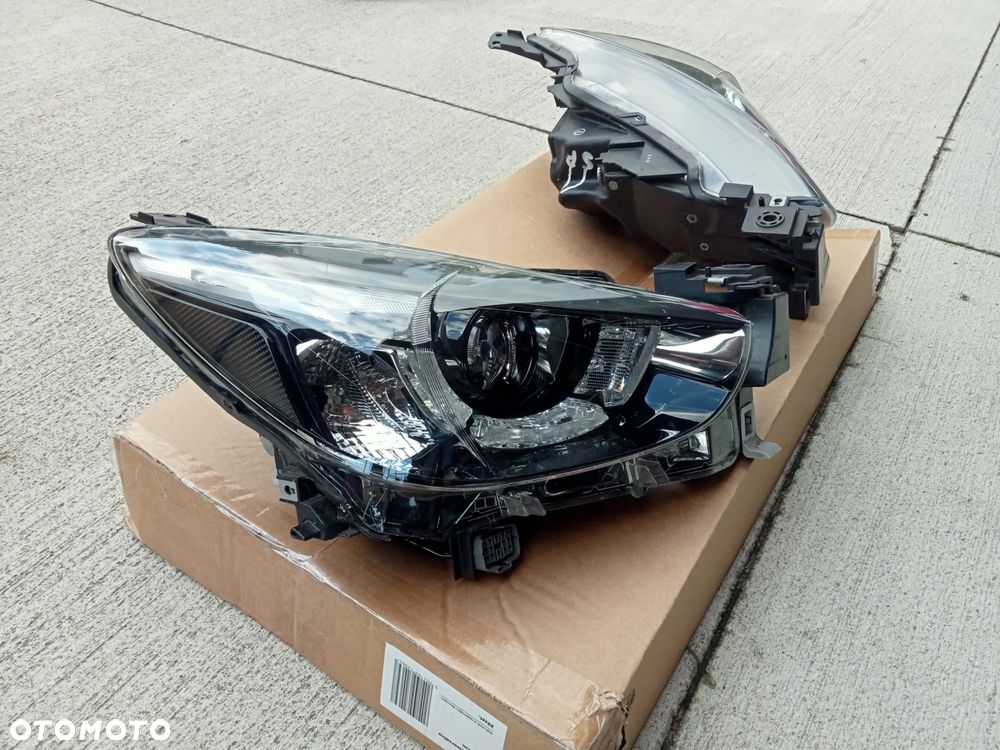 Grill Mazda 2 2015- 2025 części zderzaka DJ DL - 16