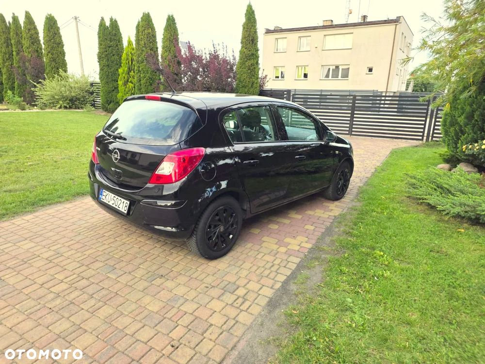 Opel Corsa 1.4 16V Enjoy - 11