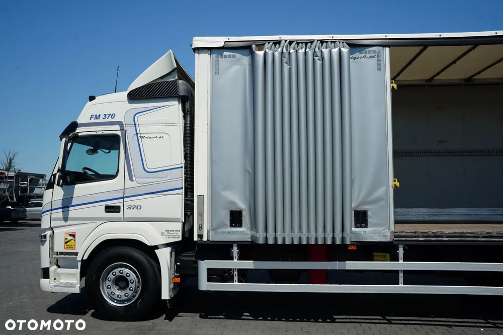 Volvo FM 370 / SOLÓWKA / FIRANKA - 9,1 M / 6X2 / WINDA DHOLLANDIA - 2 000 KG / MOCNA PODŁOGA / KLIMA POSTOJOWA / I- SHIFT / EURO 6 - 25