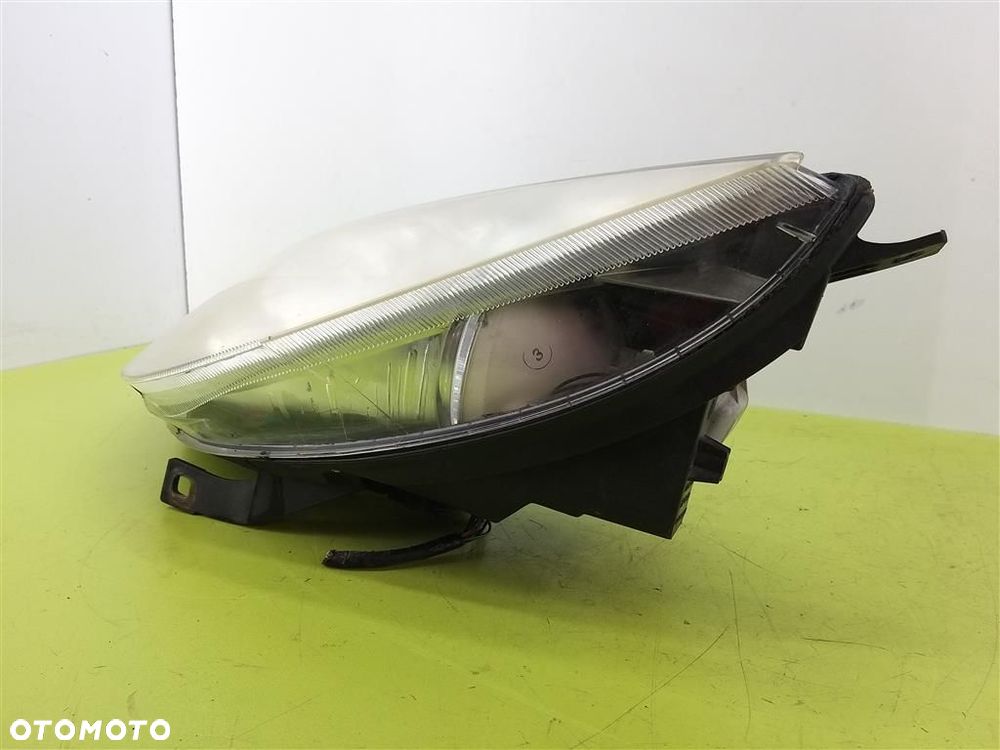 Reflektor lampa przód lewa Mitsubishi Colt Z30 2004-2008 ORYGINAŁ - 4