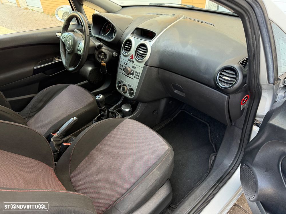 Opel Corsa 1.2 16V Enjoy - 11