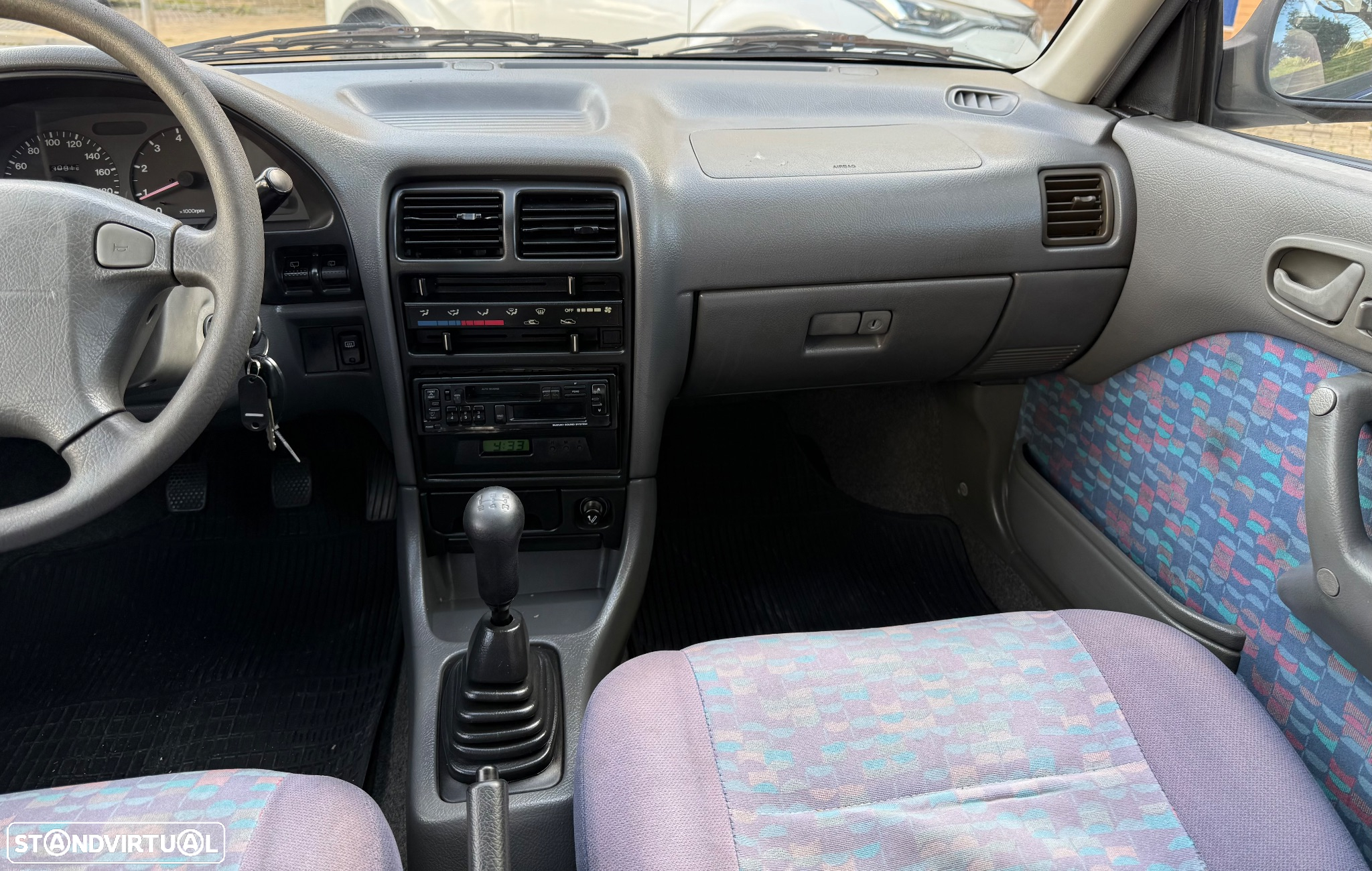 Suzuki Swift 1.0 GLX DA - 17
