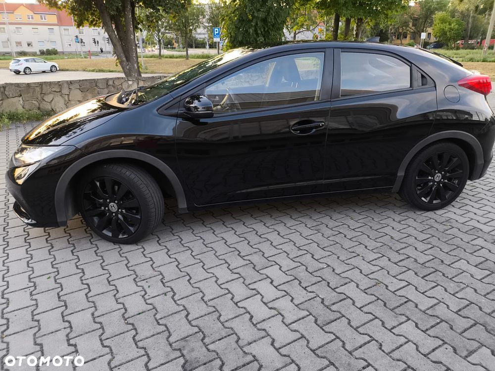 Honda Civic 1.4 i-VTEC Comfort - 11
