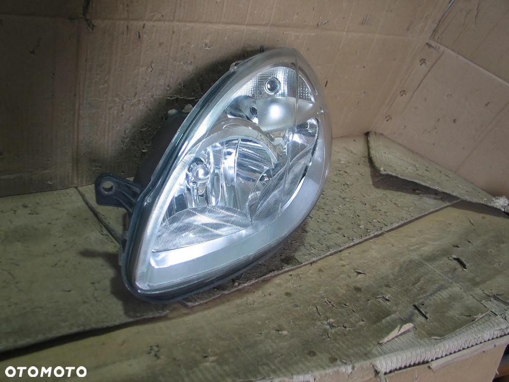 lampa przod lancia ypsilon 2 II lift 06-11r. oryginal europa - 5