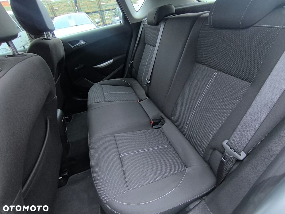 Opel Astra 1.6 Cosmo - 8