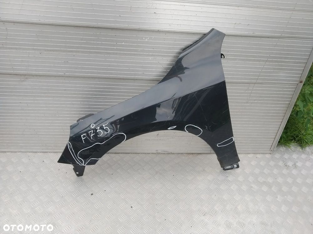 F735  BŁOTNIK VOLVO V60 S60 2013 - LEWY - 1