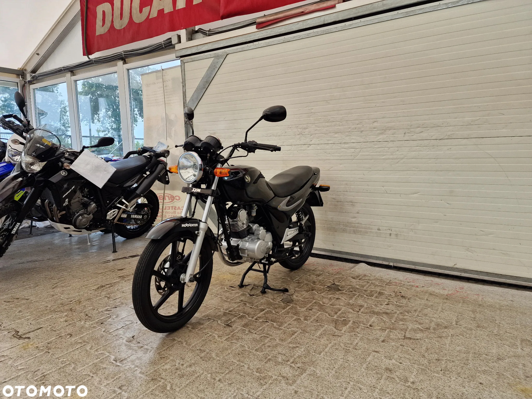 SYM XS - 17