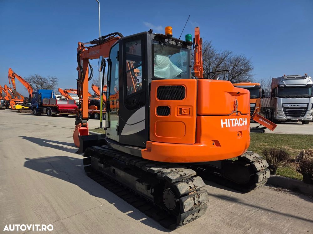 Hitachi ZX85, 2022, 2.491h, 8,6t, CUPLA RAPIDA HIDRAULICA+3 CUPE NOI, LAMA NIVELARE, ad sapare 5m, inst picon, instalatia rotire atasament, senile cauciuc, AC, Camera spate, ridica 4,5t, latime 2,2m, CA NOU, posibilitate leasing 4 ani-PROMOTIE 62.900 EUR+Tva - 3