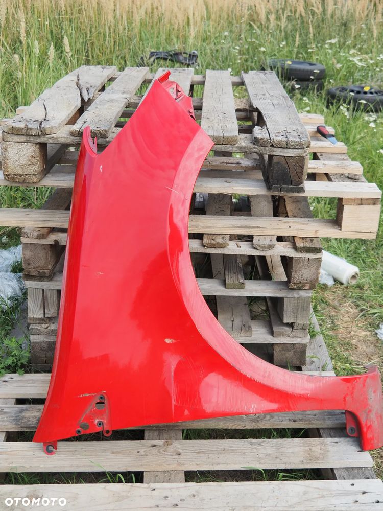 Błotnik przód przedni prawy Renault Clio III Lift 185 OV727