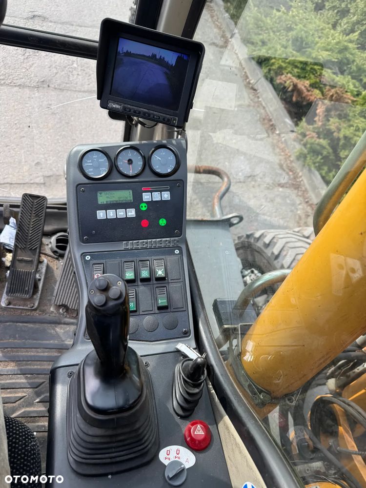 Liebherr 314 Litronic Rotator - 22
