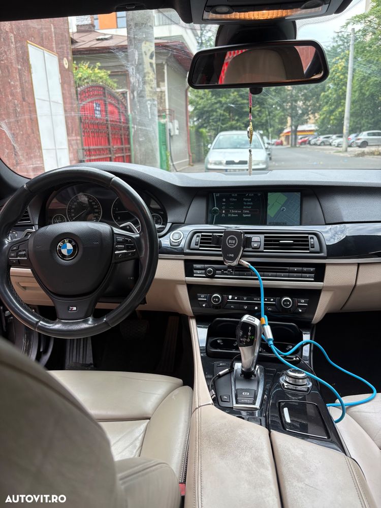 BMW 5 Series 2010 — imagine 12