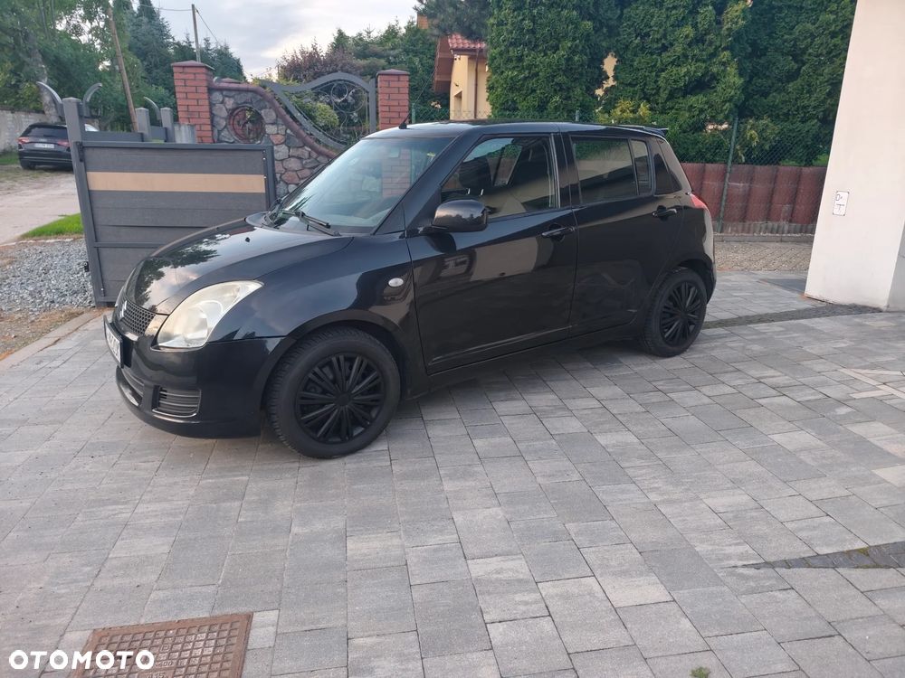 Suzuki Swift 1.3 Club - 3
