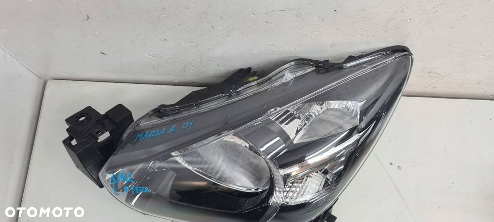mazda 2 14- lampa reflektor lewy eu ładny - 4