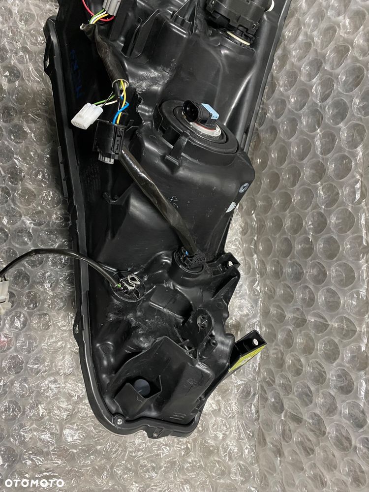 LAMPA LEWA ZWYKŁA CZARNA NISSAN MICRA K14 26060 5FA08 KOITO 100-18728 - 12