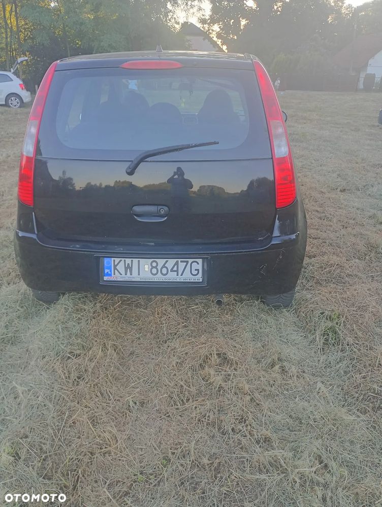 Mitsubishi Colt 1.1 - 4