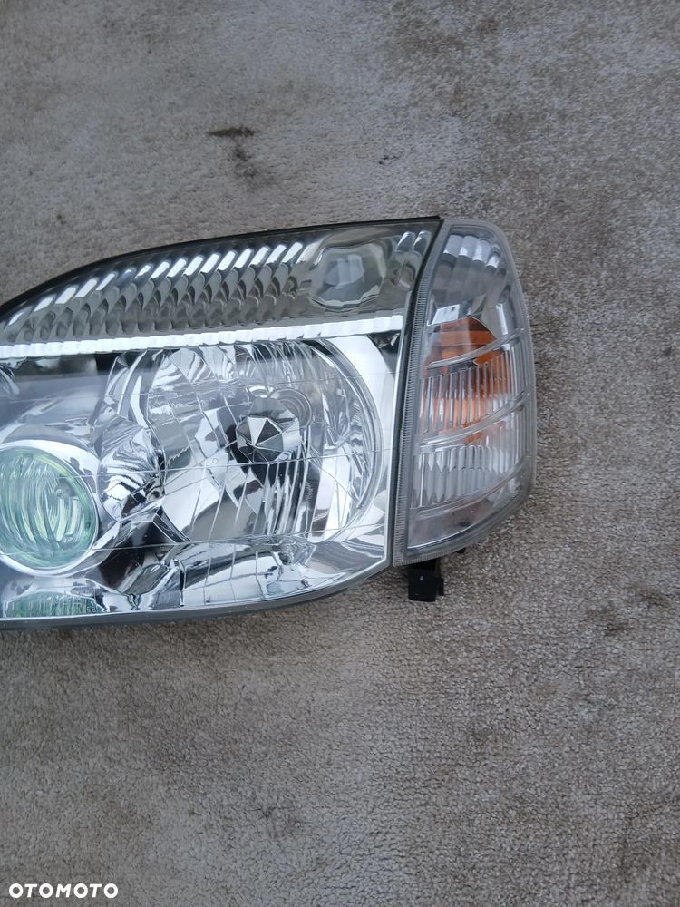 LAMPA PRZEDNIA LEWA I PRAWA NISSAN X-TRAIL T-30 EUROPA - 7