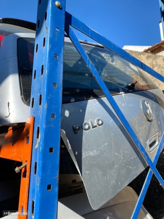 Tampa da mala porta Vw Polo 2001 - 1