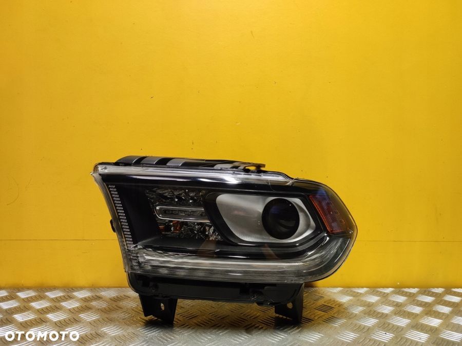 DODGE DURANGO 2014- REFLEKTOR LAMPA ZWYKŁA SOCZEWKOWA BEZ LED L USA - 1