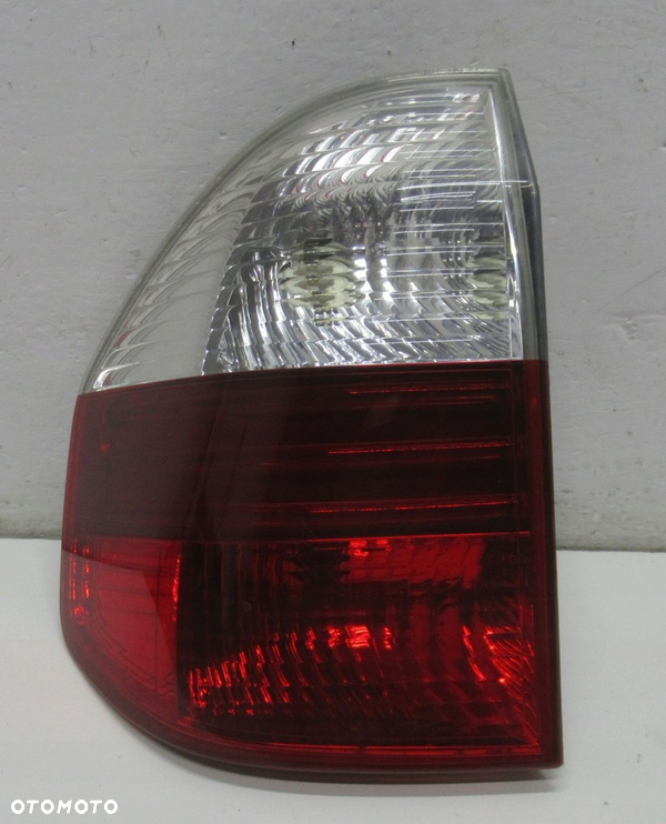 BMW X3 E83 LAMPA LEWY TYŁ 7162209