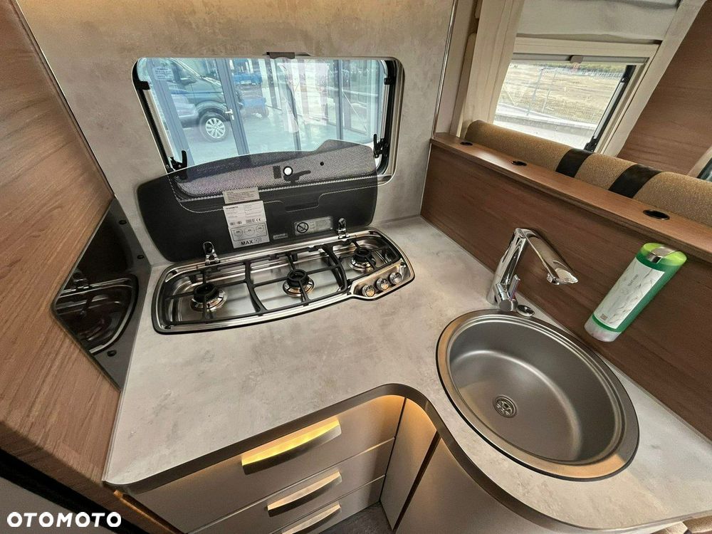 KNAUS LIVE WAVE 700 MX z łóżkiem królewskim - 11