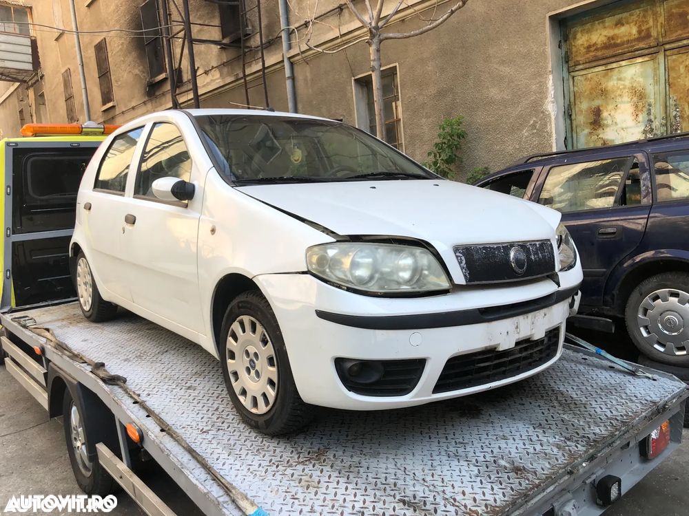 Aripa dreapta fata Fiat Punto alb 2007 - 1