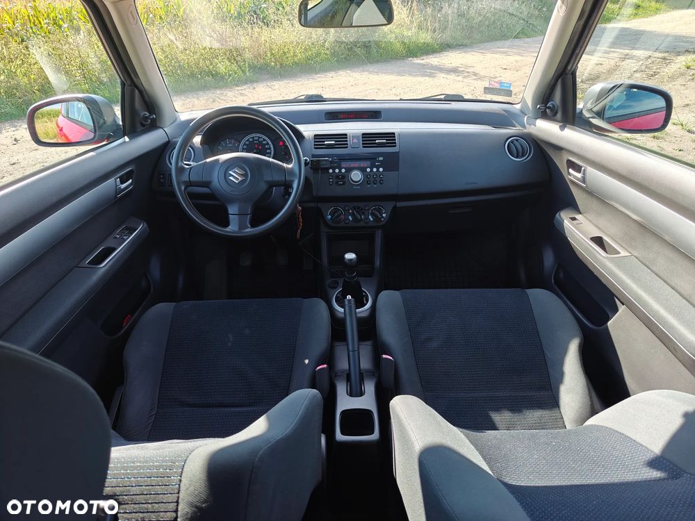 Suzuki Swift 1.3 Club - 11