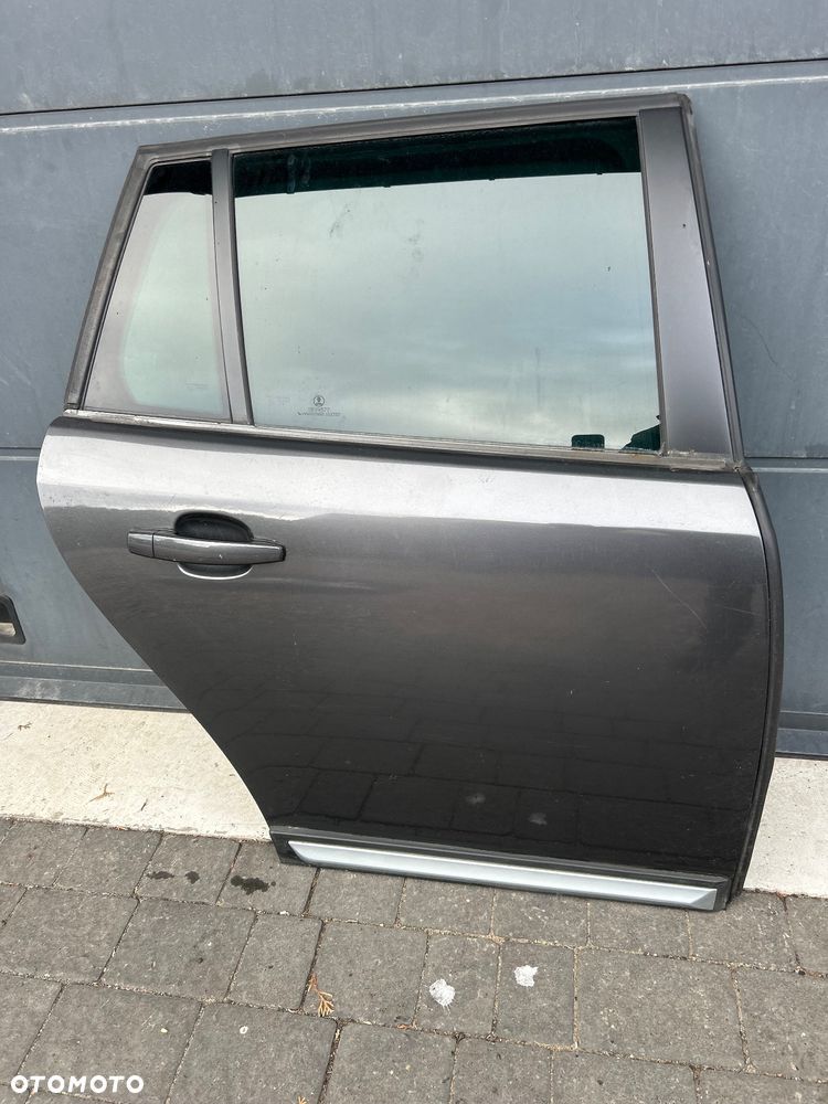 Saab 93 9-3 X kombi drzwi prawe tylne prawy tył  kolor 310 , lift 08-11