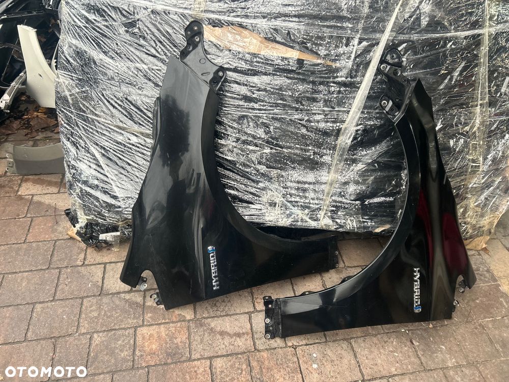 TOYOTA COROLLA E21 HB BŁOTNIK LEW/PR.209 ORG. - 1