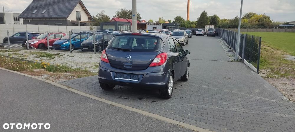 Opel Corsa 1.2 16V Cosmo - 5