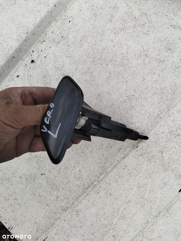 Toyota Corolla Verso lift spriskwacz lampa lewy - 1