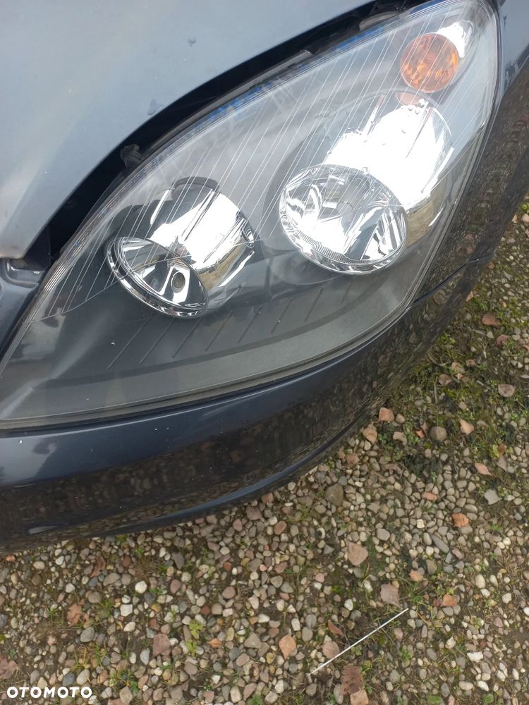 Opel Zafira B 1.6 16V 10r Z168 lampa przednia prawa lewa ciemna - 2