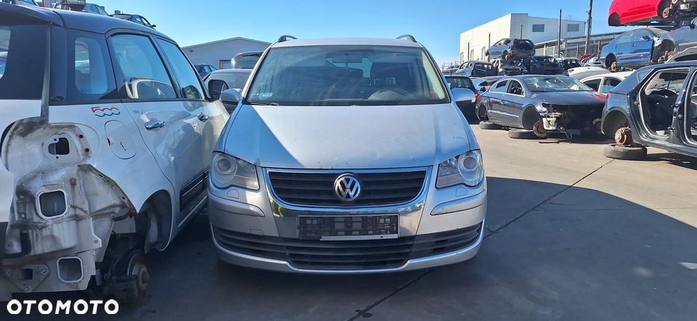 Volkswagen Touran 07- Lift Zderzak Przód Przedni Kod Lakieru LA7W Srebrny