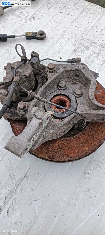 Fuzeta Stanga Fata cu Rulment si Senzor ABS Renault Laguna 3 2.0 DCI 2007 - 2015 Cod 400150006R [V0053] - 2