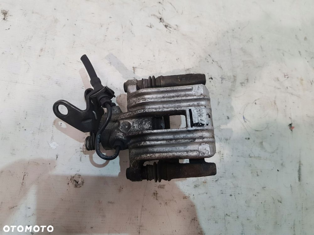 zacisk hamulcowy lewy tył vw audi skoda eu - 1