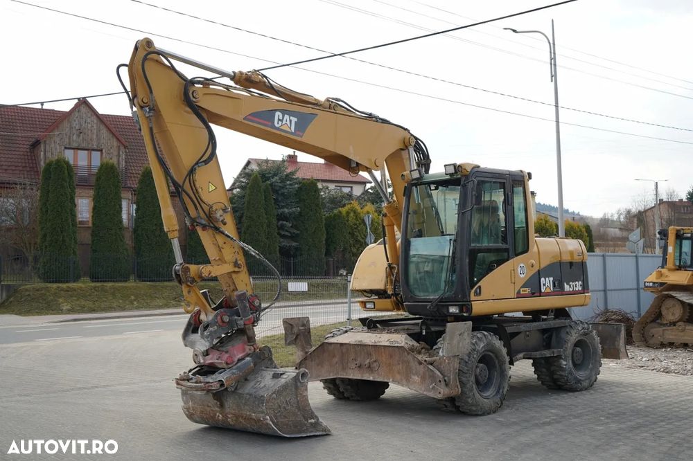 Cat M313C / EXCAVATOR PE ROȚI / CU ÎNCLINARE PIVOTANTĂ - 1