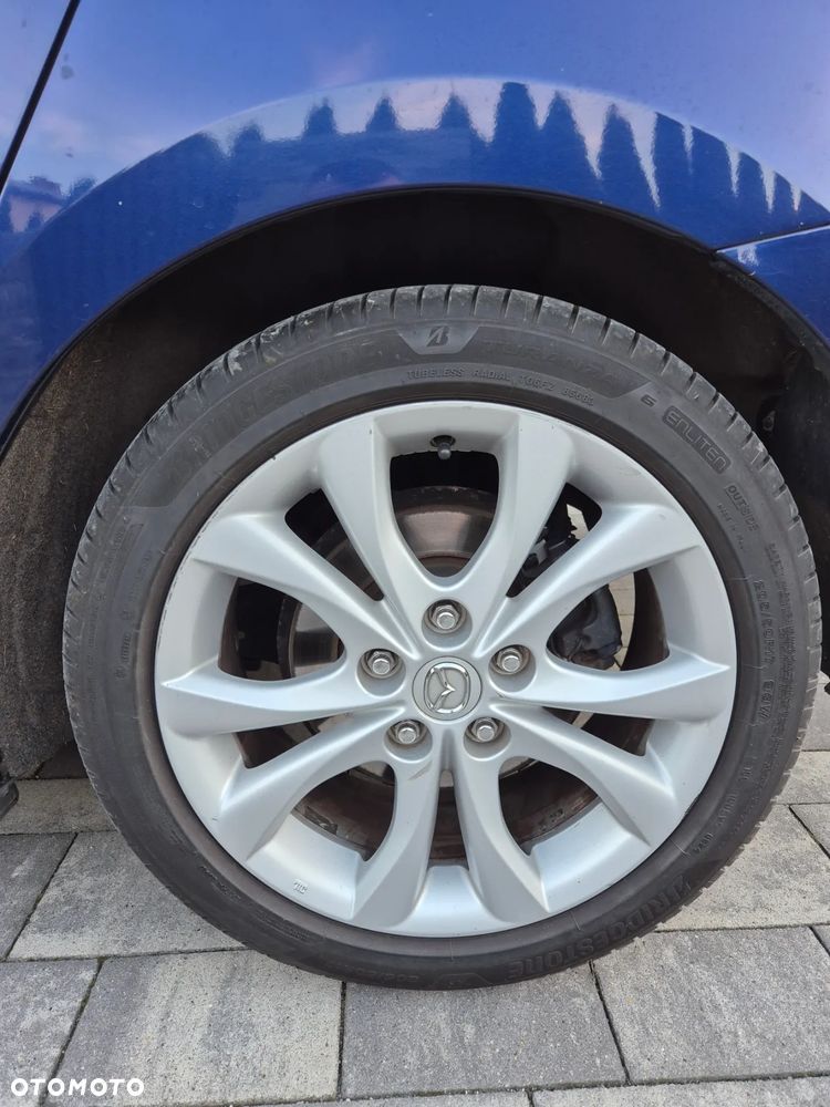 Mazda 3 2.0 Exclusive + - 10